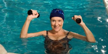 Granny exercising in a swimming pool