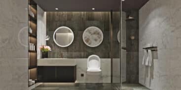 A modern bathroom with a walk in shower enclosure and free standing bath