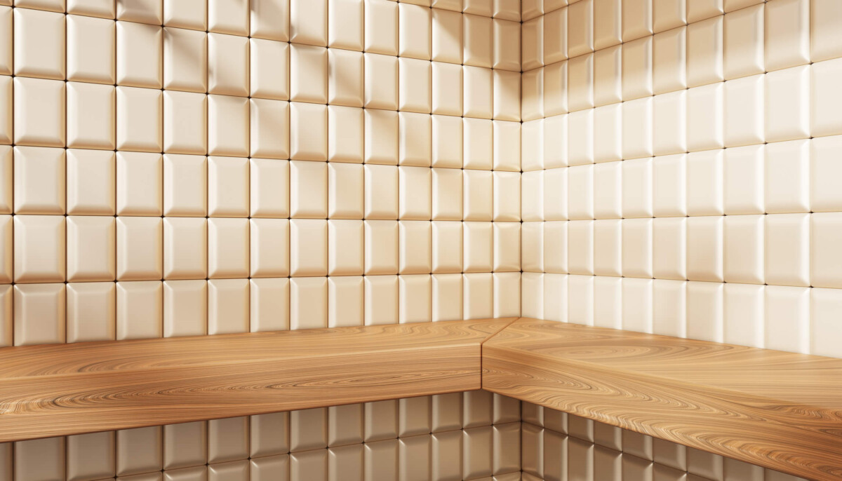 empty room corner with wood shelf and shadow on beige tile wall.