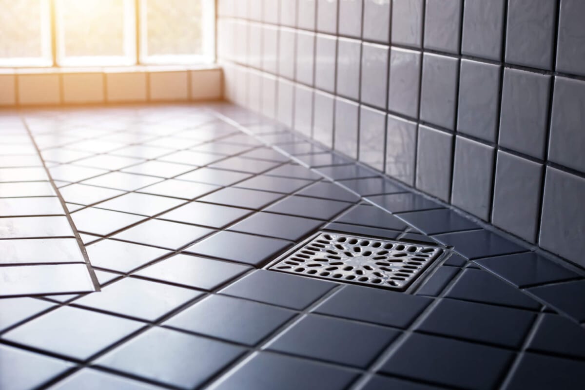 Blue tiled bathroom flooring