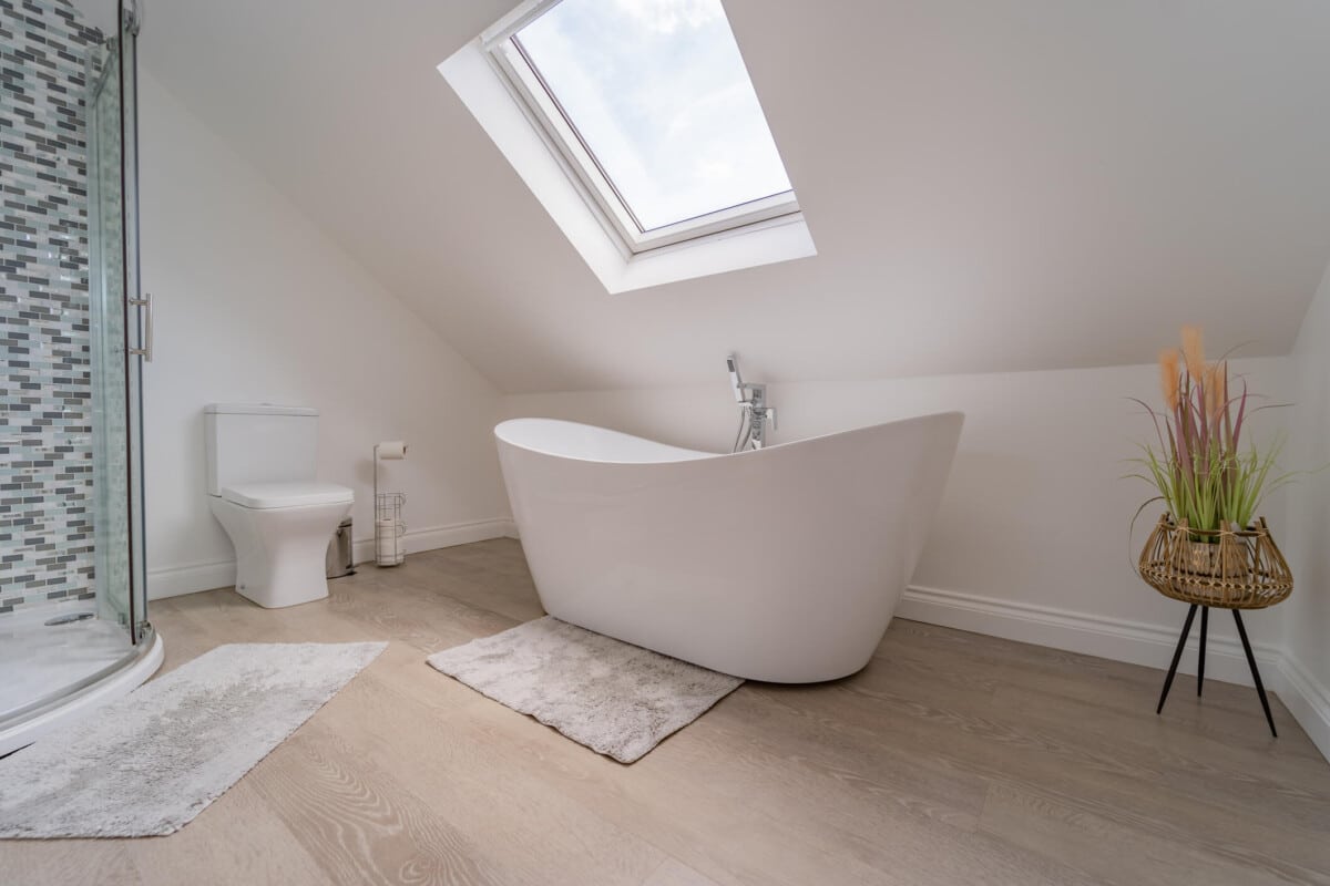 Wooden bathroom flooring.
