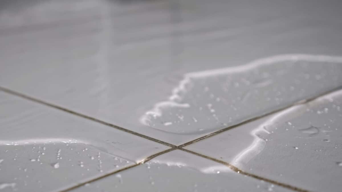Waterproof bathroom flooring with water.