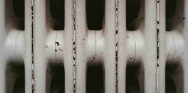 An image of a radiator which is starting to rust.